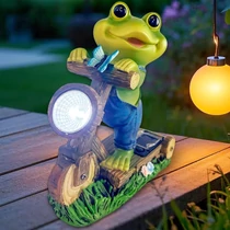 Napelemes béka kerti dekoráció LED lámpással - kerti szobor teraszra, kertbe